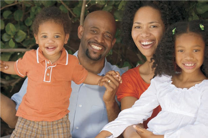 Photo of an African-American family of four Photo of an African-American family of four